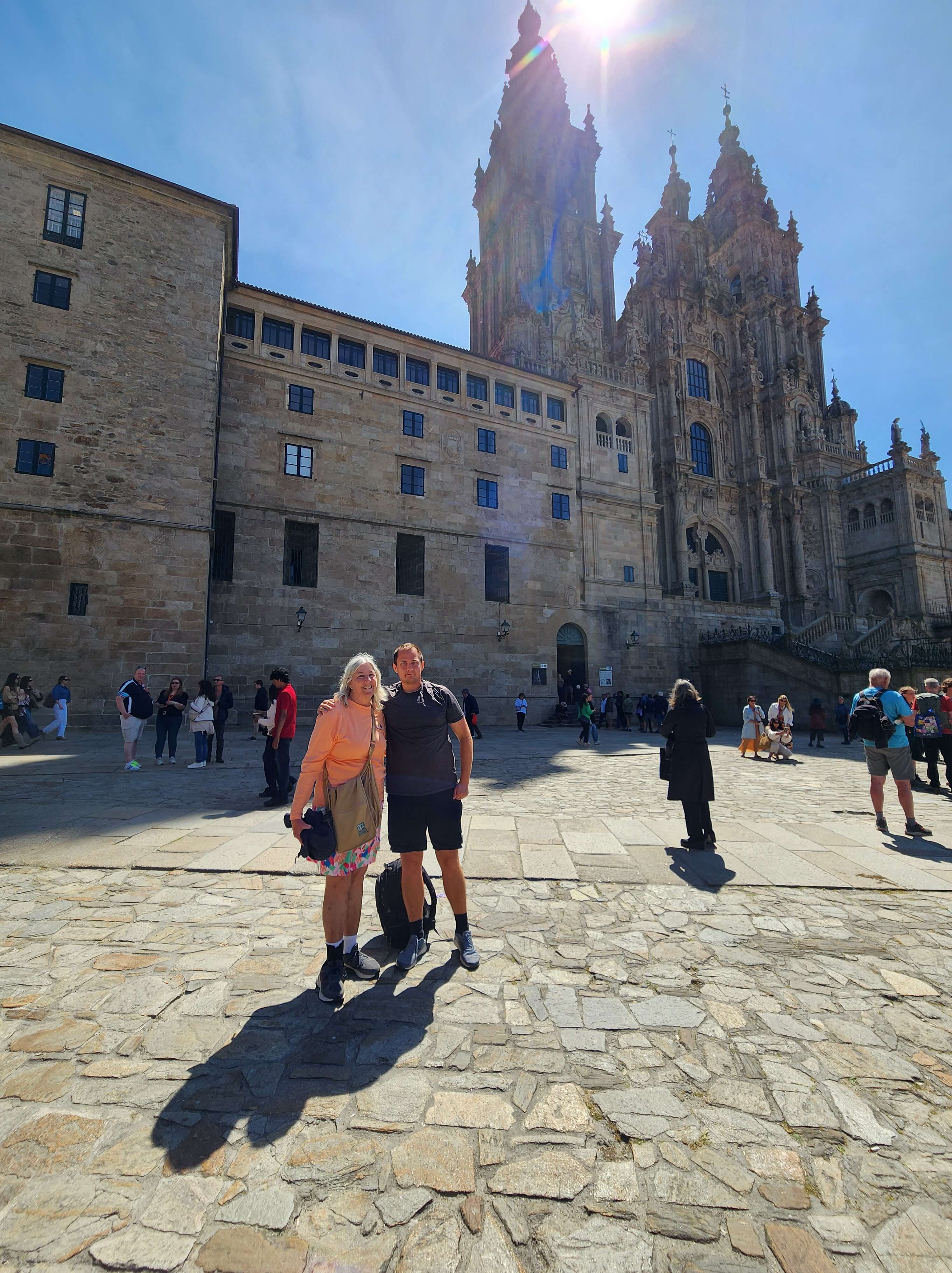 cfe79208 alison pockat 2 hikers pose in front of cathedral 20250523 123802