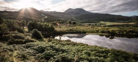 Lake, mountains and sunburst on the Kerry Way