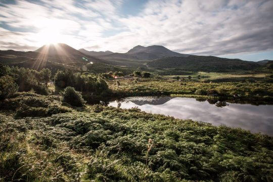 Lake, mountains and sunburst on the Kerry Way