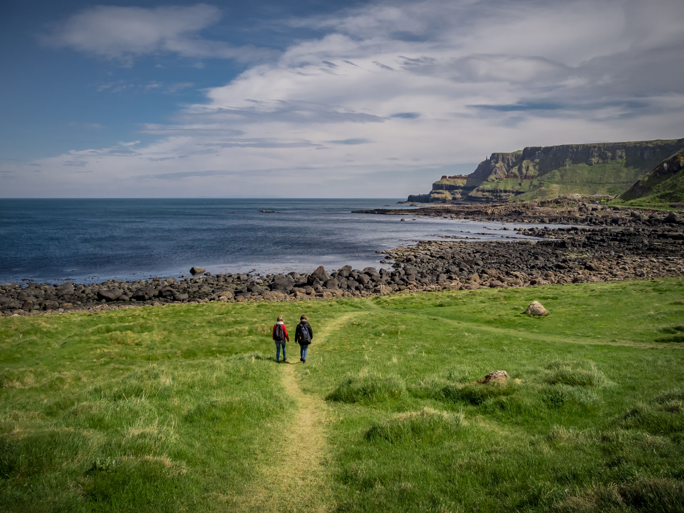 two girls travel to giants causeway in northern ireland