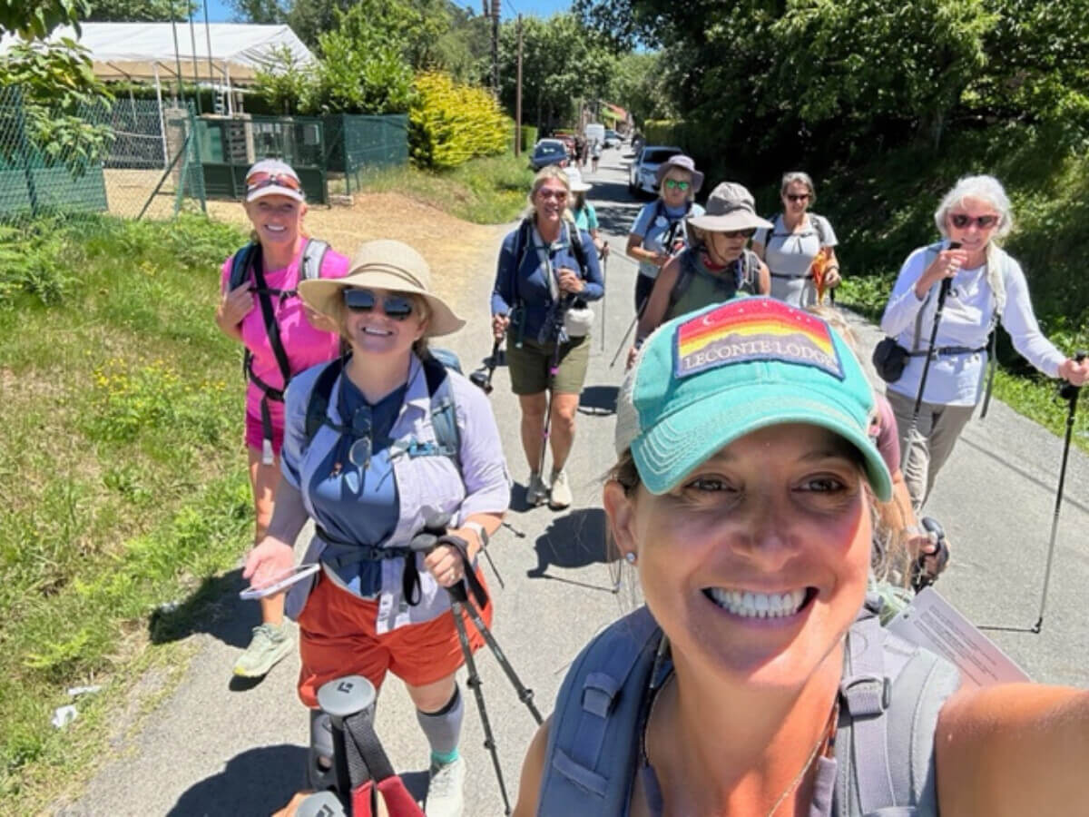 A group of happy female hikers enjoying the cool on the Camino Frances