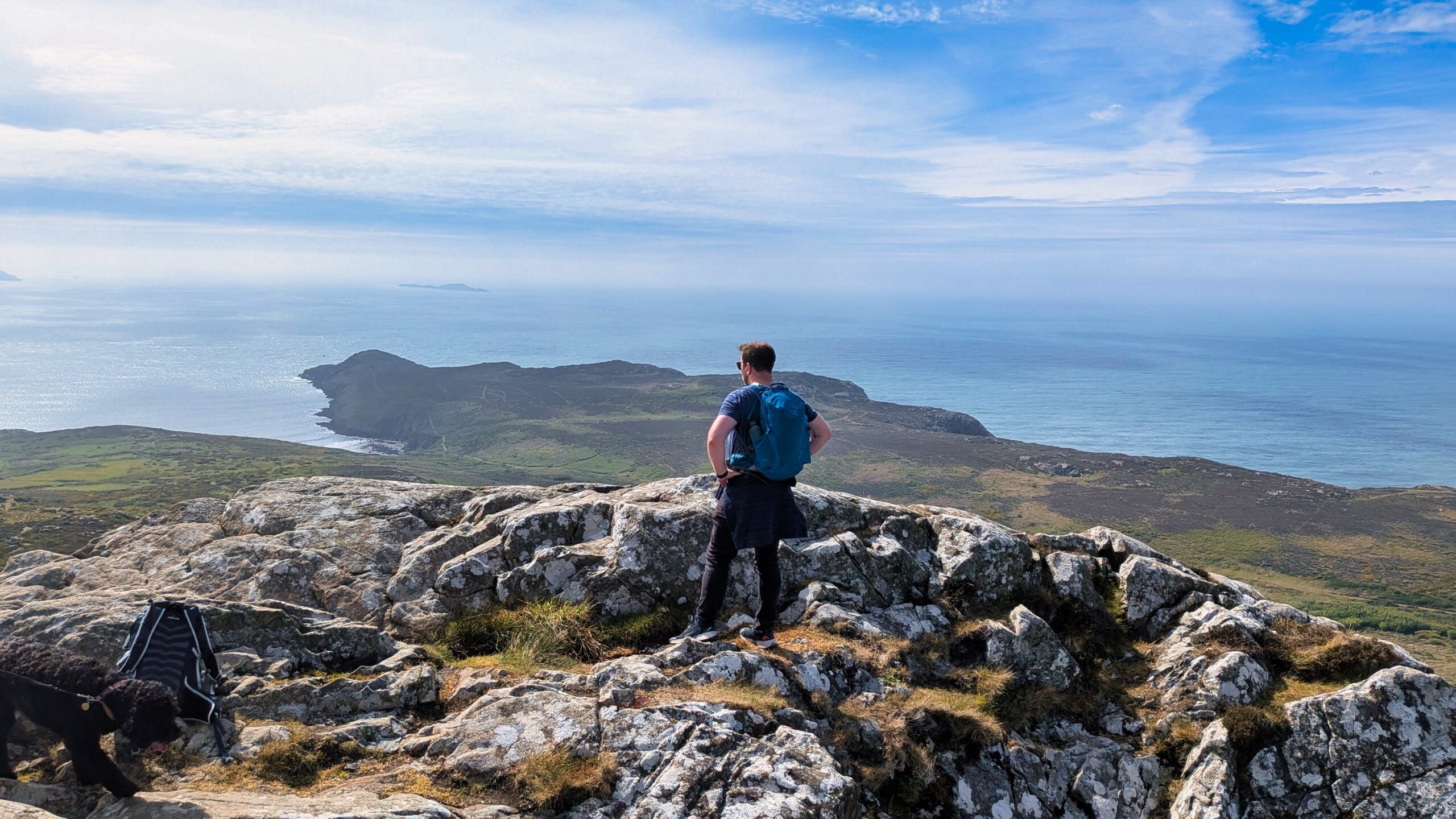 pcp carn llidi hiker looks out to coast from top of rocky climb pxl 20260521 145245473 (1)