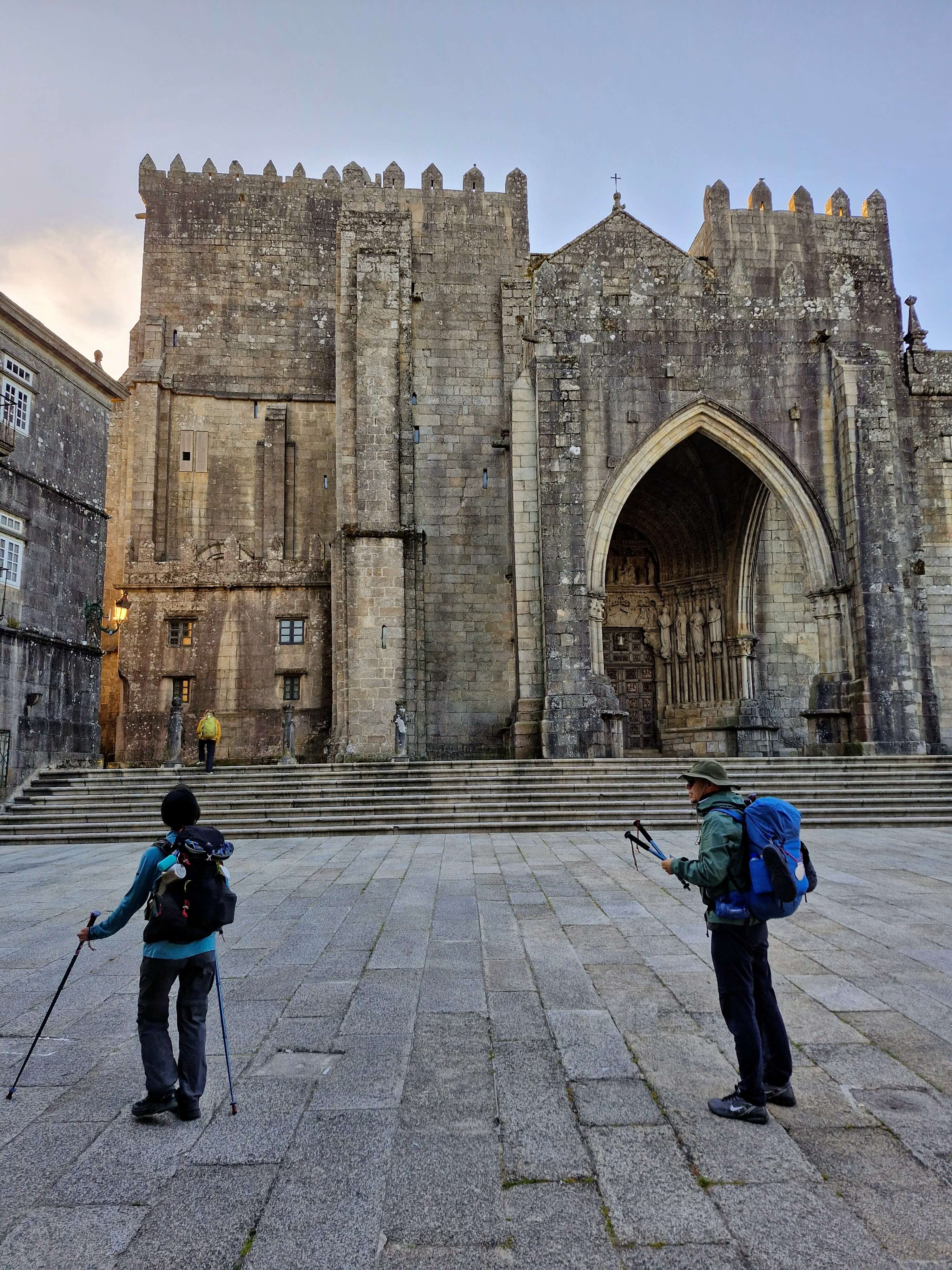 Walkers in front of Tui Cathedral in the morning