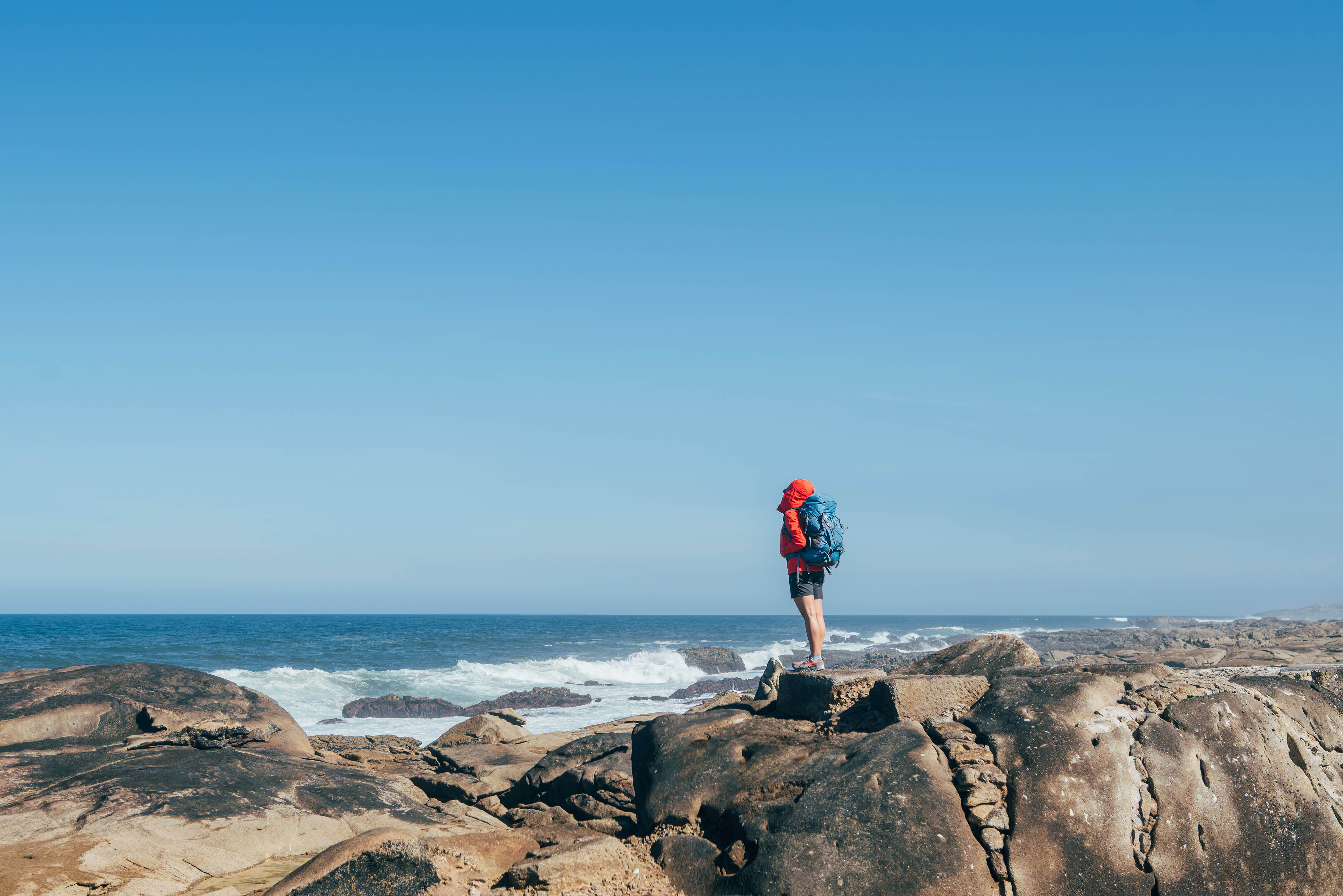 Camino Portuguese Coastal Route, a hiker takes in the wild Atlantic Coastline in Portugal