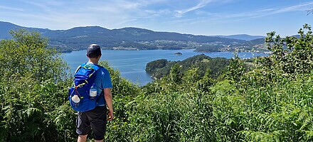 Hiker takes in a view of the river below on the Camino Portguese (Traditional Route)