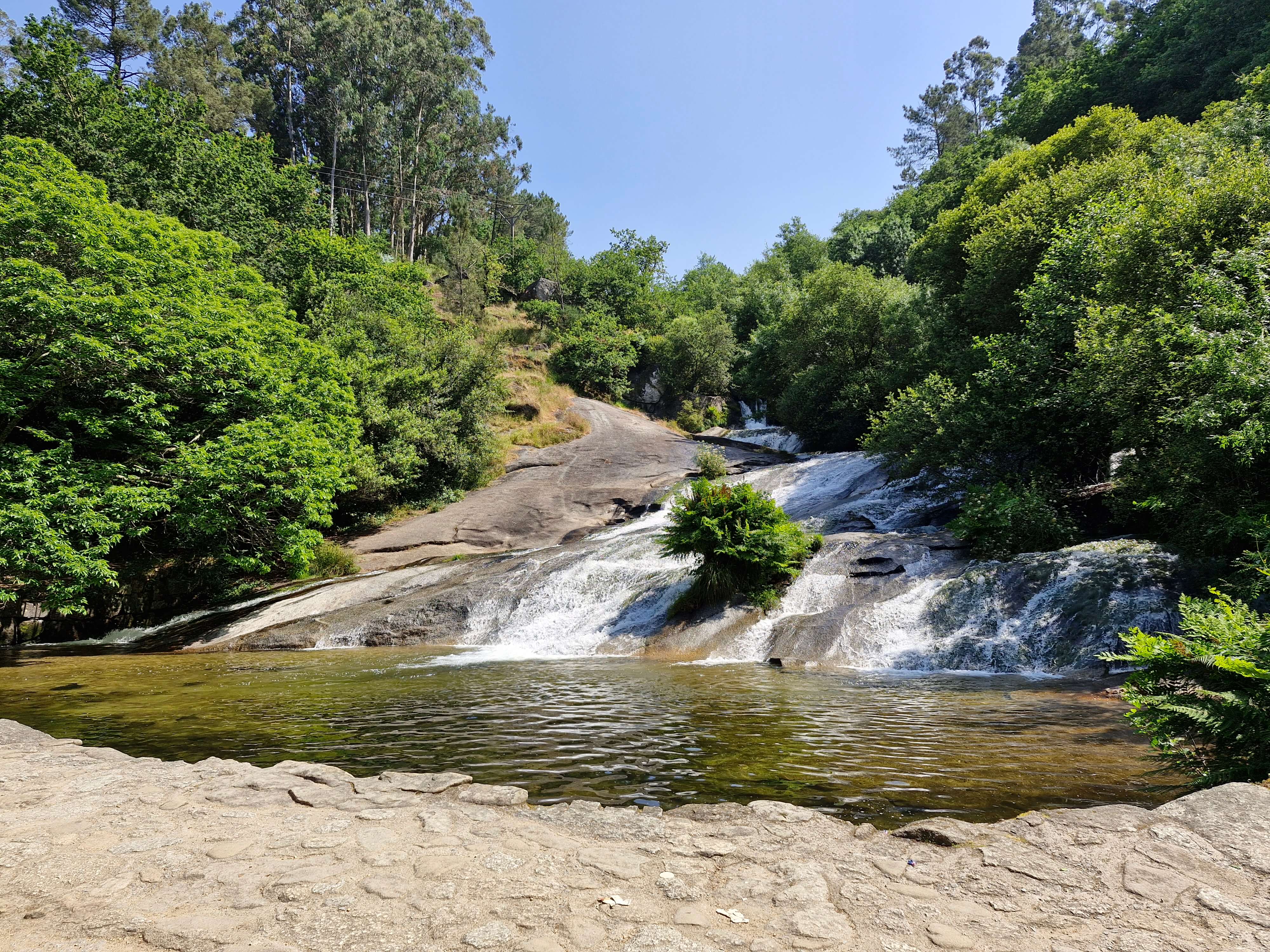 The waterfall at Parque Natural Ría Barosa a short distance off the Camino Portuguese