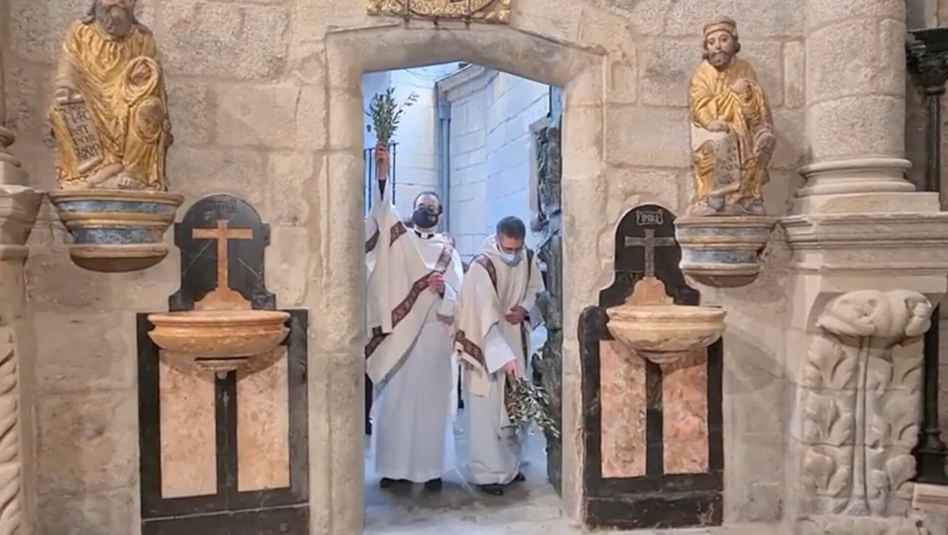 camino holy year priests clean bless door