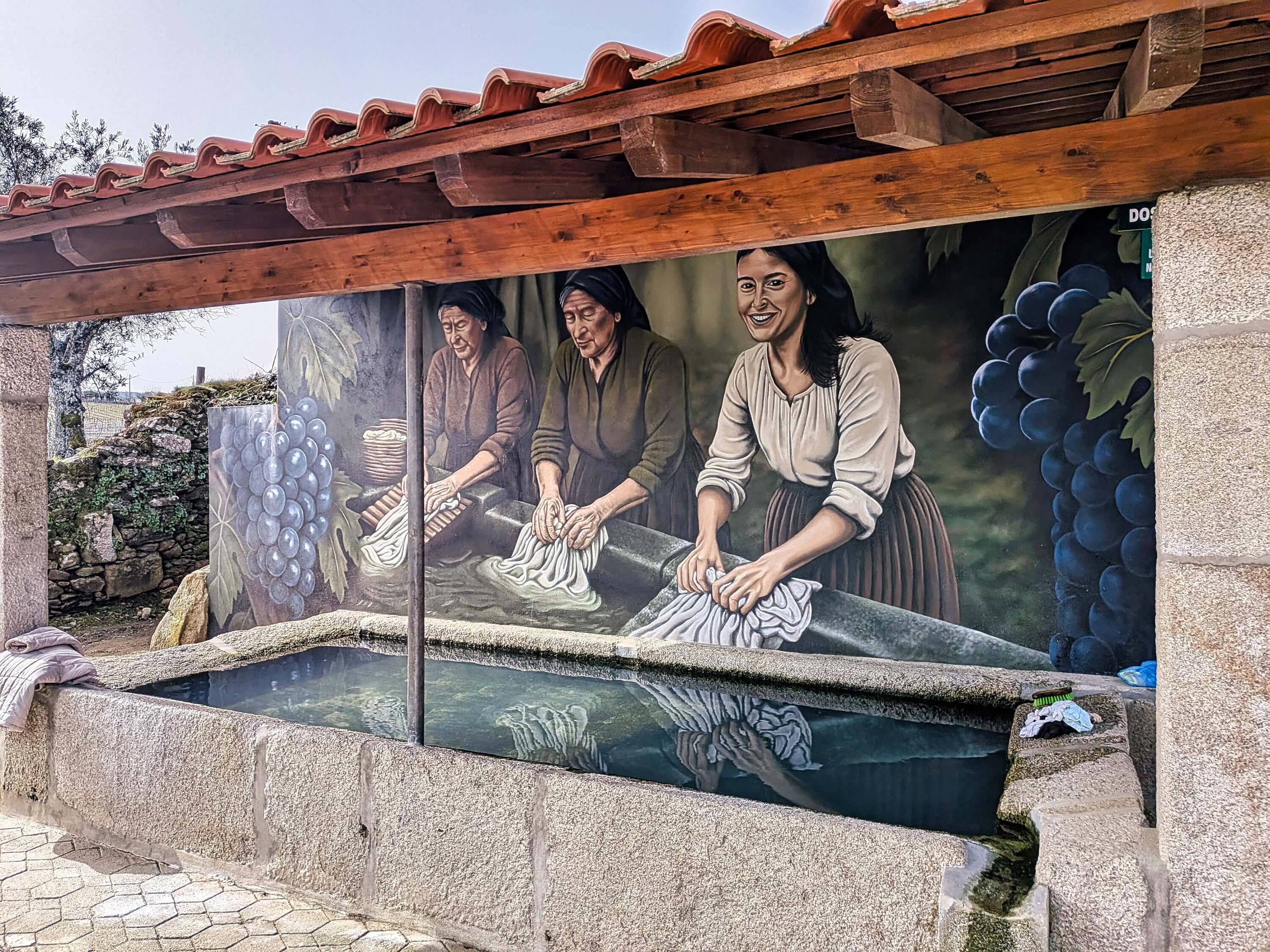 douro communal laundry area with historic mural pxl 20260304 111439927.mp