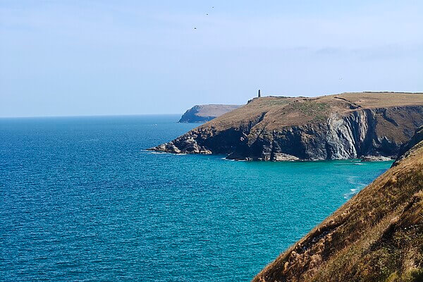 Coastal view of stepper point in the distance on the south west coast path - hillwalk tours
