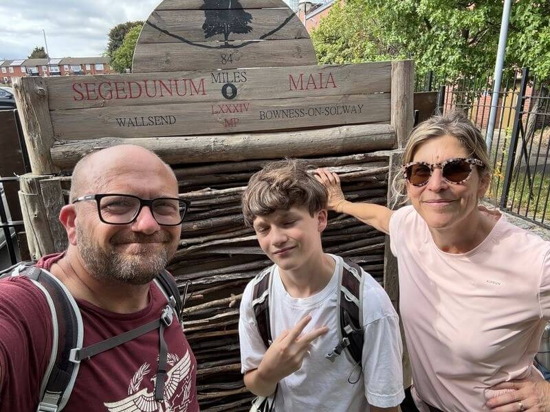 Eli and family successfully finish their last stage to complete their journey adventure along the length of Hadrian's Wall - Hillwalk Tours